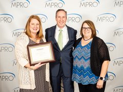 Emergency Department Manager, Becky Sliva and Medical Surgical Unit Manager, Patti Dittrich accepting the Governor's Award of Excellence on behalf of OSF HealthCare St. Francis Hospital & Medical Group