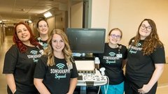 group of ultrasound technologists smiling