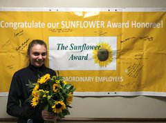 Sydney Donaldson, OB Tech accepts the Sunflower Award